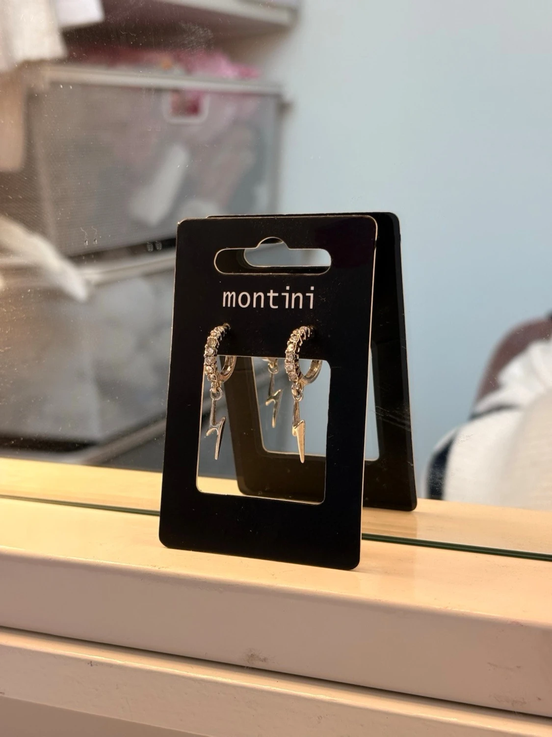 Silverörhängen med blixtar