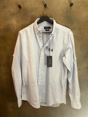 Ljusblå Lin skjorta från Polo Ralph Lauren - Helt ny Polo Lin skjorte, ingen skader eller bruksmerker 