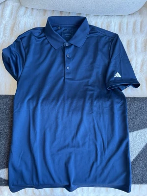 Golfpiké Adidas - Golfpiké Adidas, använd en gång 