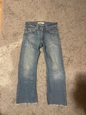 Levi's bootcuts 512 - Levi 512                                                               W 27   Läng 90 cm benöpning 22.5cm