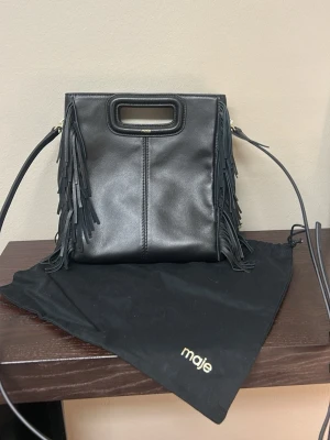 Maje väska - Jättefin väska från Maje!! Säljer den då den inte längre kommer till användning. Fint skick och pris kan diskuteras!! 