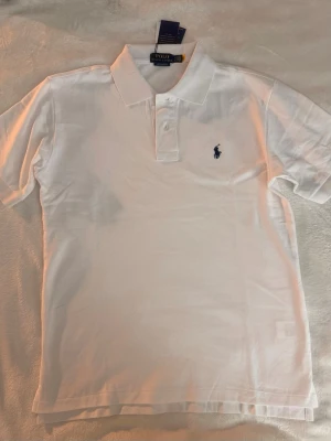 Vit Polo Ralph Lauren Piké - Helt oanvänd med prislapp. Storlek S/M