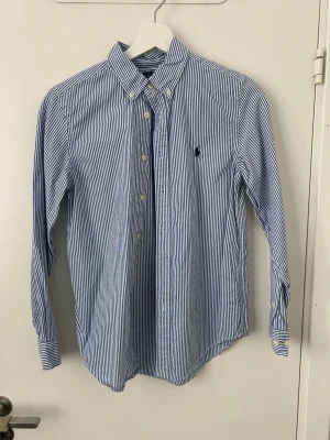 Polo skjorta - Skriv om frågor