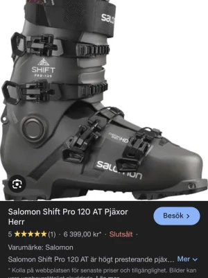 Salomon Shift Pro 120 AT pjäxa - Salomon Shift Pro 120 AT är en svart pjäxa med fyra spännen och robust design. Märket och modellen syns tydligt på sidan. Pjäxan har detaljer i svart och grått samt justerbara remmar för optimal passform. Perfekt för dig som gillar alpina äventyr.