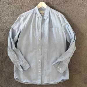 Ljusblå skjorta  - En ljusblå skjorta från Hm i storlek S