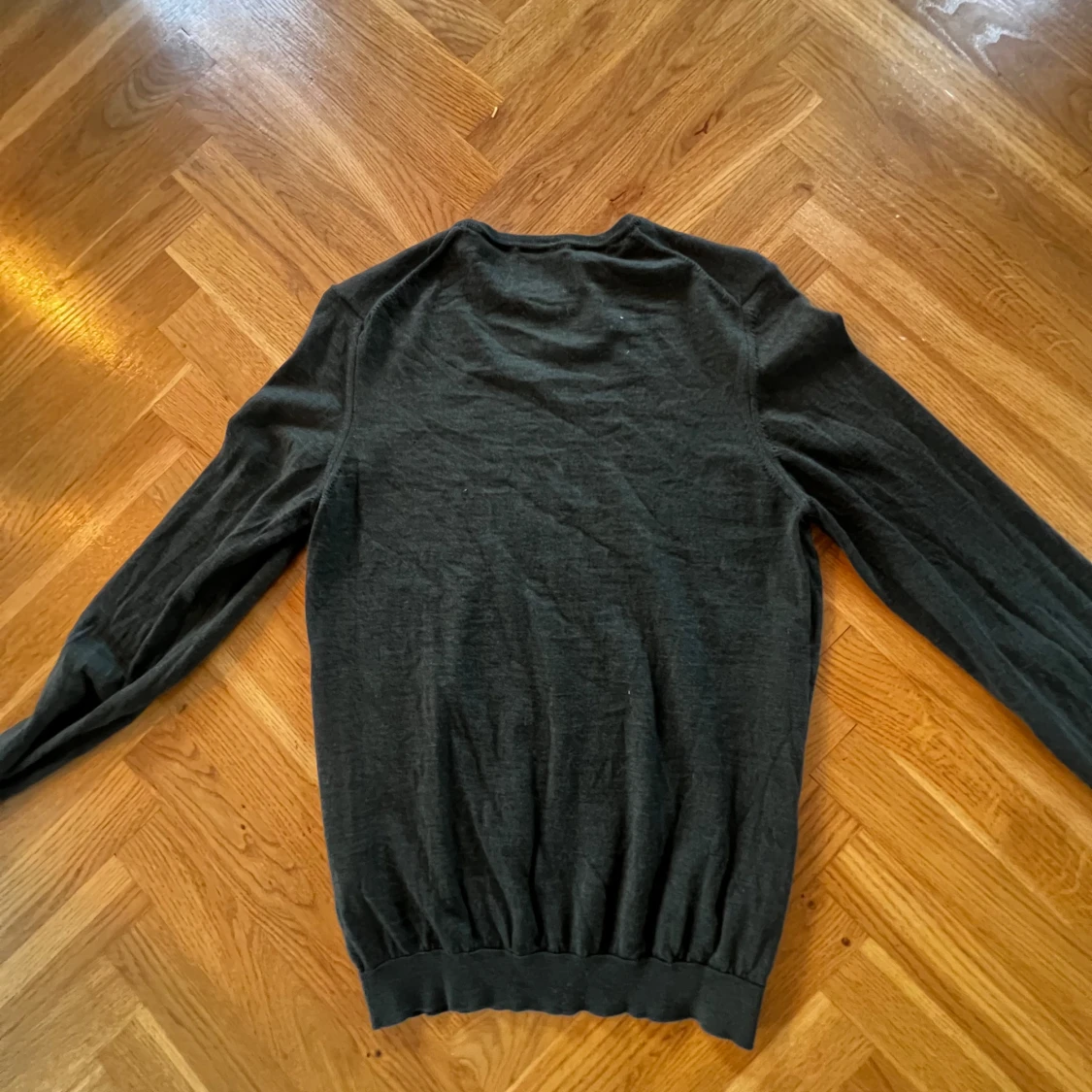 Mörkgrön merino ull tröja från NN07 - 2