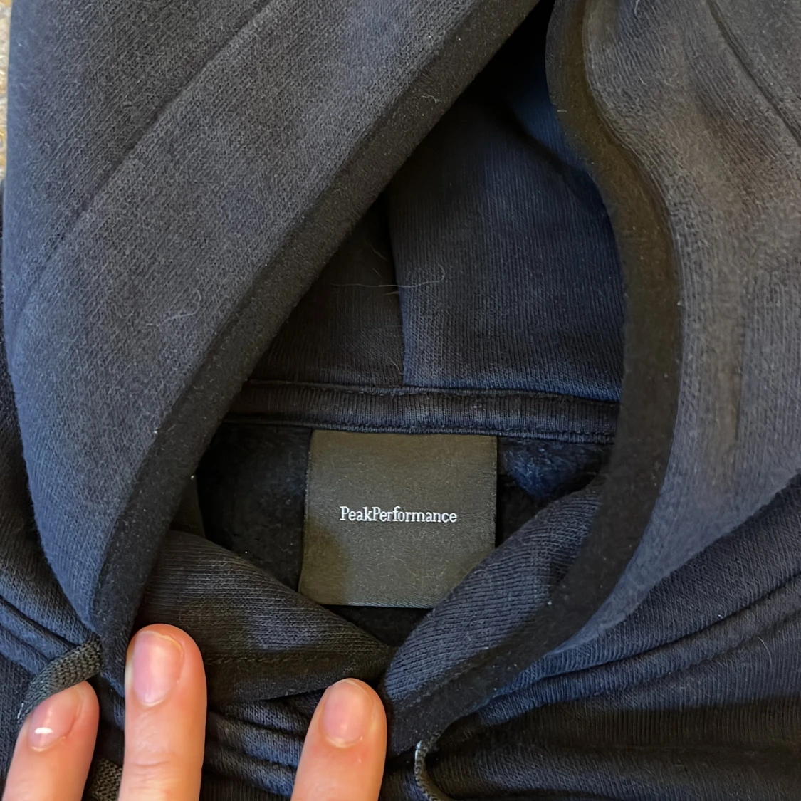 Mörkblå hoodie från Peak Performance - 2