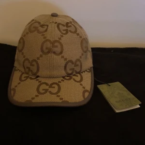 Gucci keps - En begie jumbo helt ny kan gå ner lätt i pris vid snabb affär!