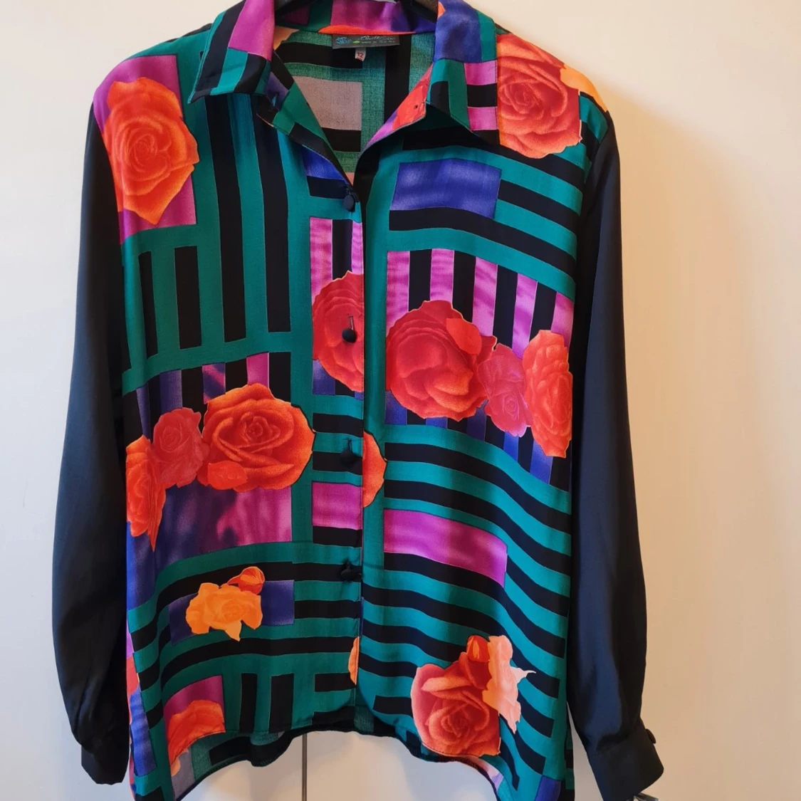 Blommig blus Electric Blue retro strl 12