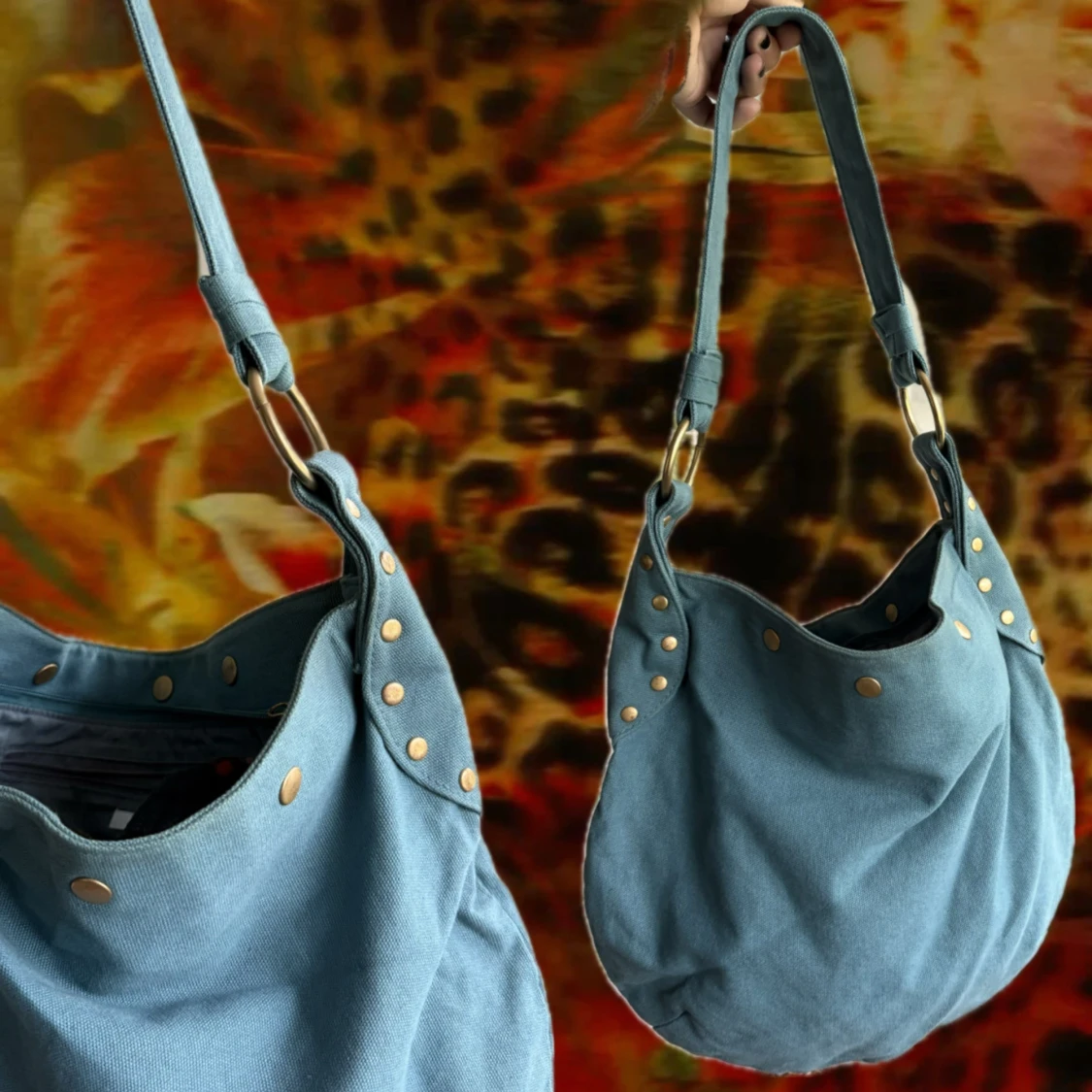 Blå axelväska med nitar och ringar