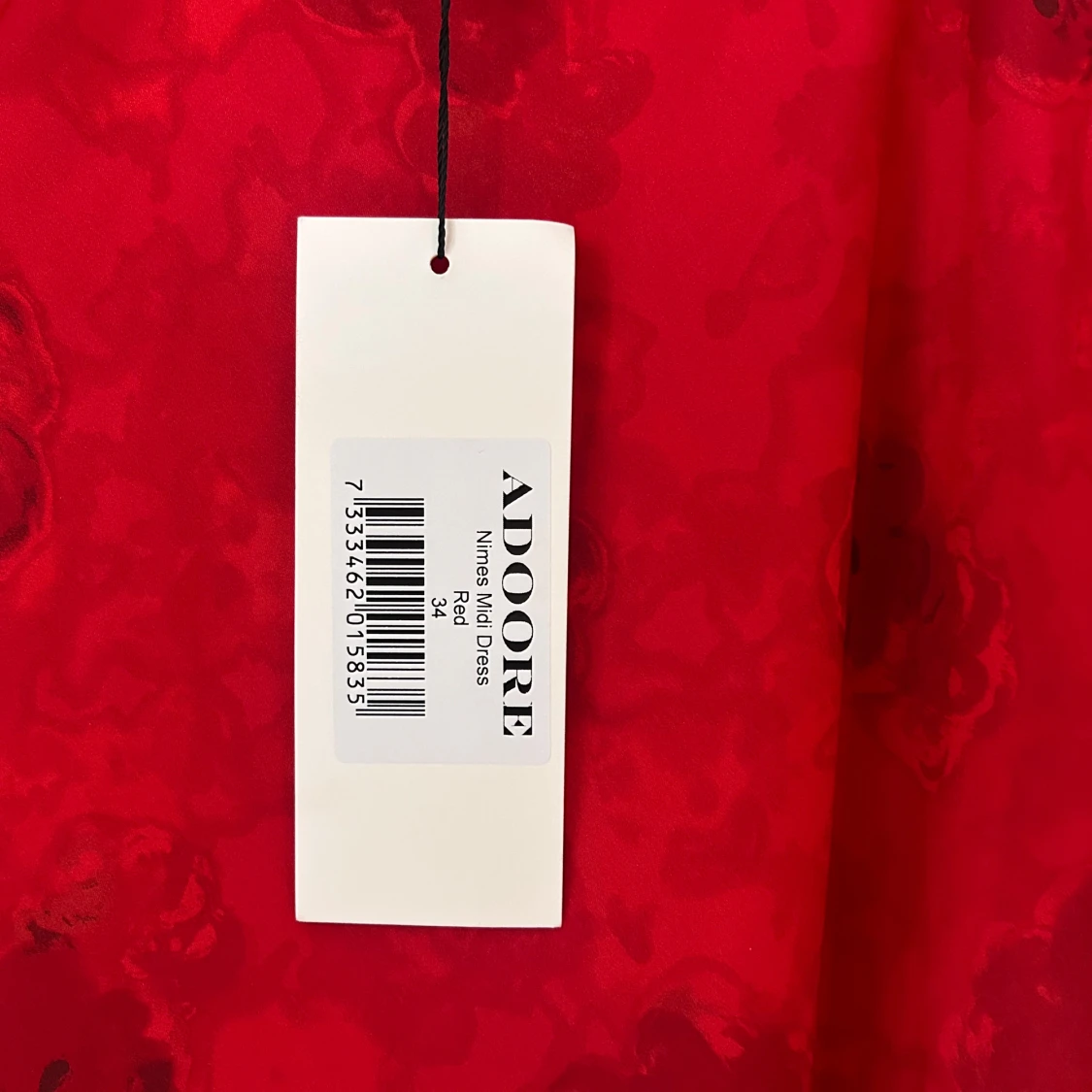 Nimes mididress från Adoore - 2