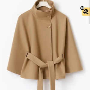 Poncho från ginatricot - Så snygg men kommer inte till användning! Använd max 4-5 gånger så i nyskick!!