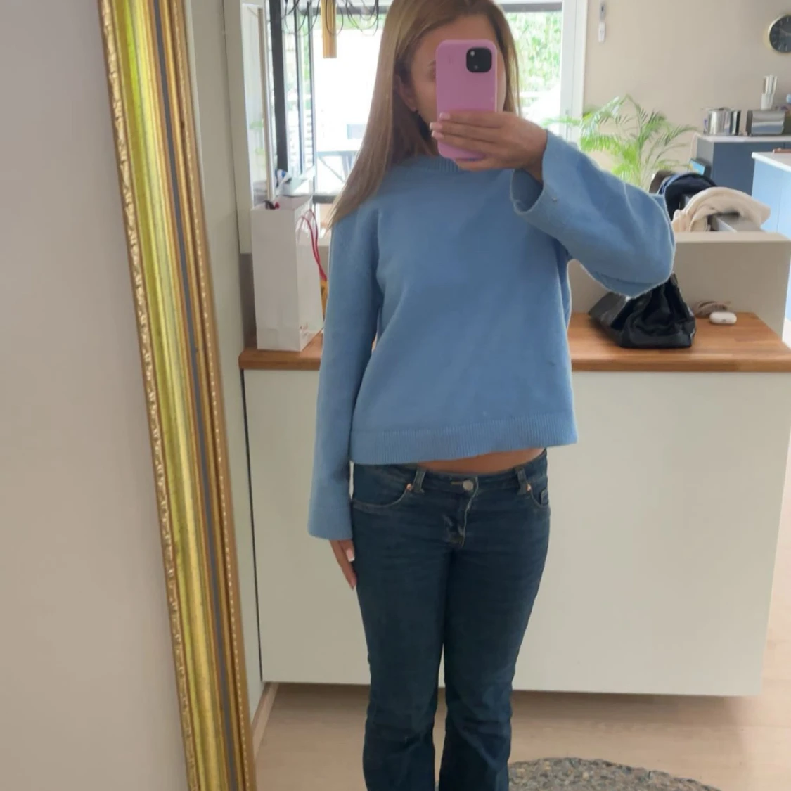 Ljusblå stickad tröja