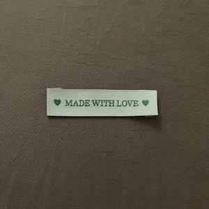 Vävda etiketter  - Säljer då de inte kommer till användning. Det är 8 stycken.