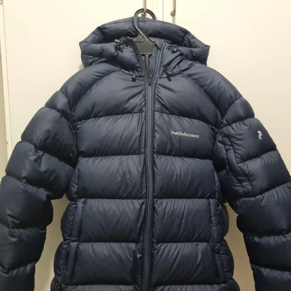 Mörkblå dunjacka Peak Performance