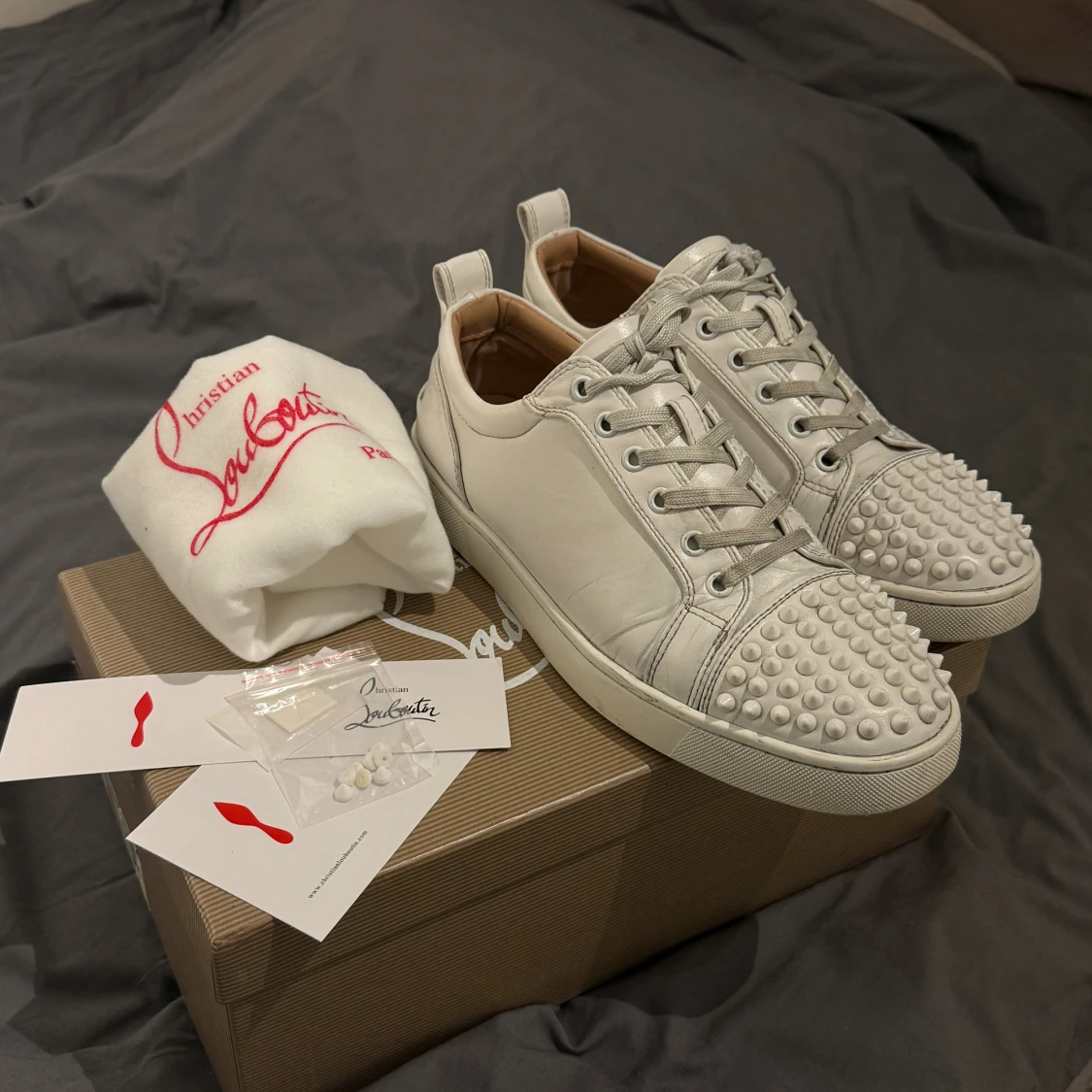 Christian Louboutin  - 1