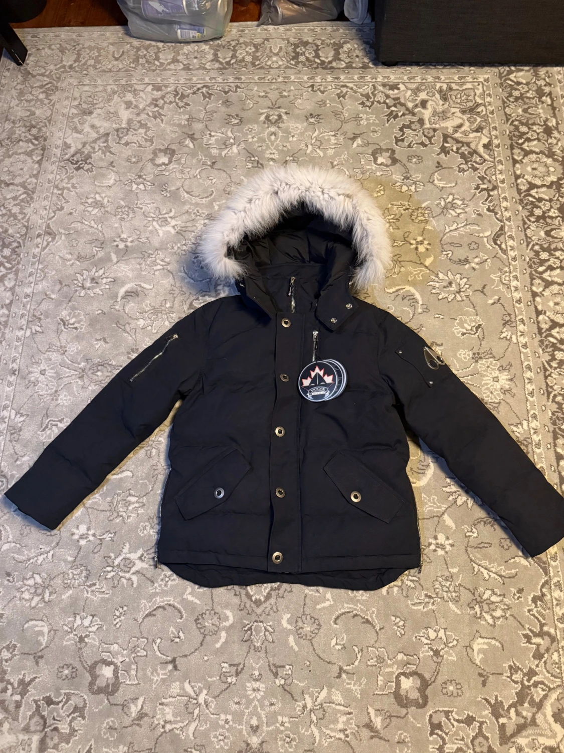 Moose Knuckles blå dunjacka med päls