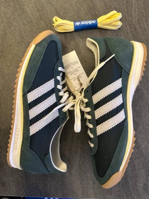 Adidas OriginalsSL 72 OG W Sneakers   - Completely new and unused. Very beautiful green color! Come with extra shoes that is light butter yellow! Size 40 women’s. Original box. Colorway: mineral green/ off white