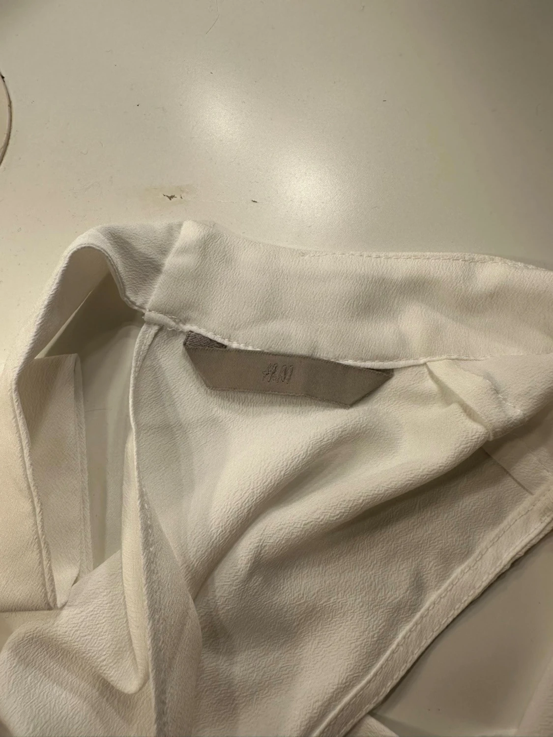 Vit ärmlös blus med rosett från H&M - 2