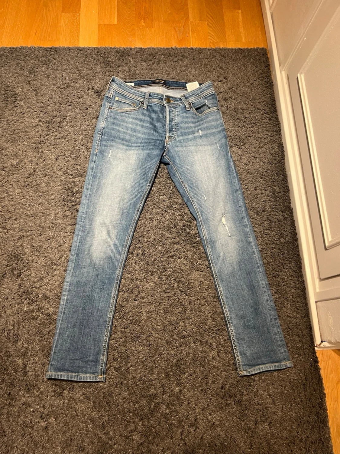 Slim Glenn ljusblå jeans storlek 28/30 - 1