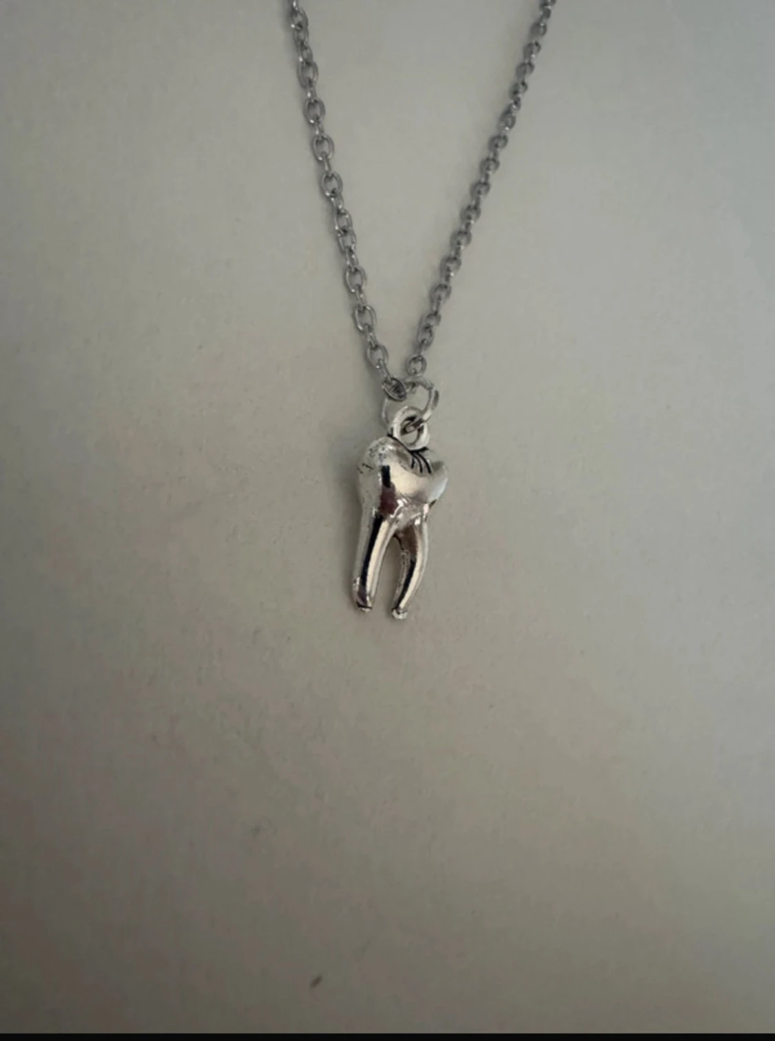 Silverhalsband tand - 1