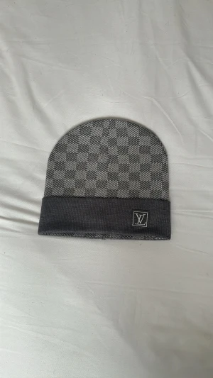 LV Gray Beanie - Slightly used, good as new