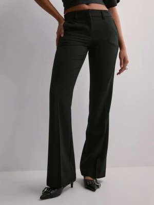 Svarta vida kostymbyxor - Snygga svarta kostymbyxor från Nelly!🥰