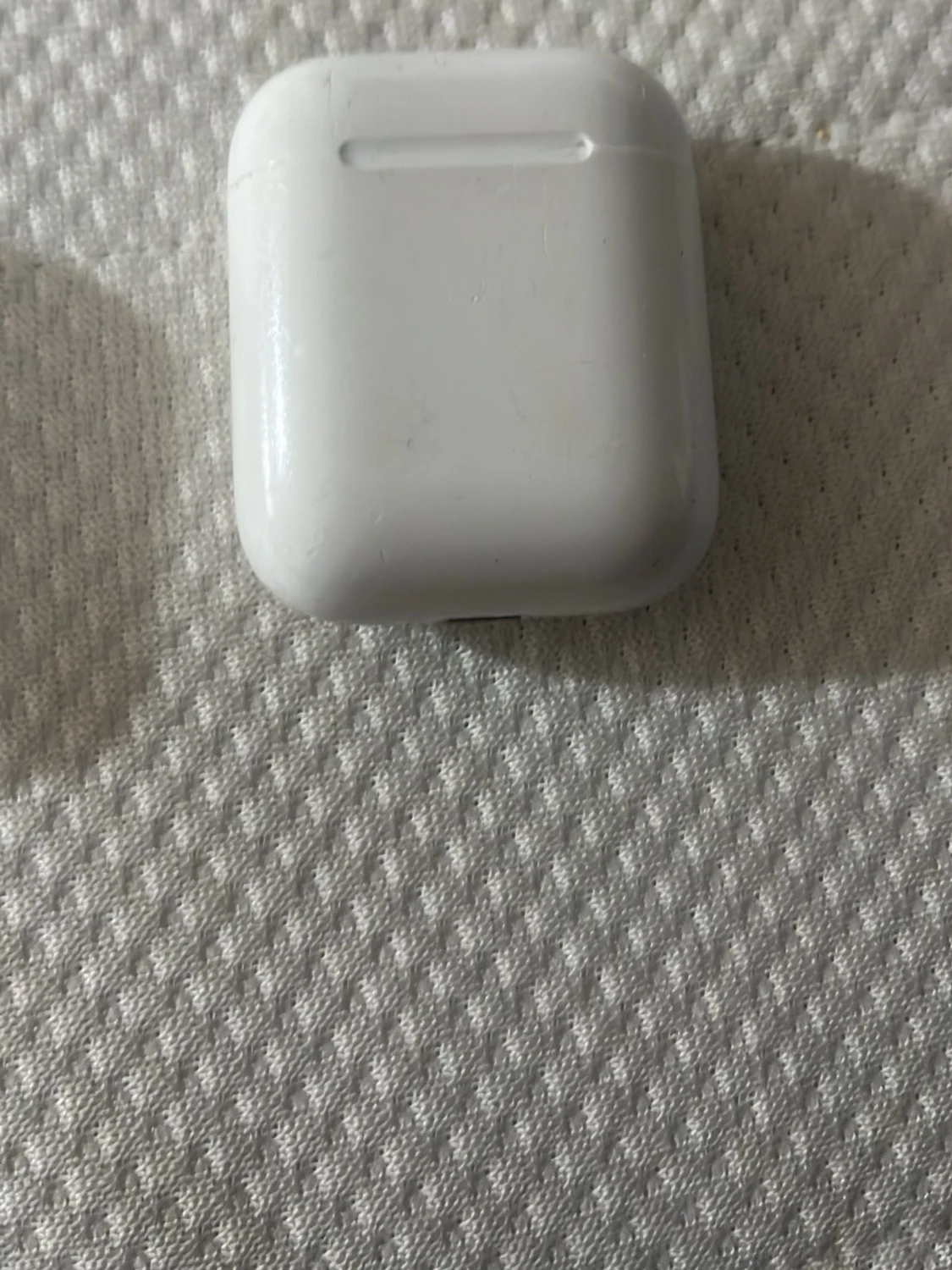 Apple AirPods med laddningsetui