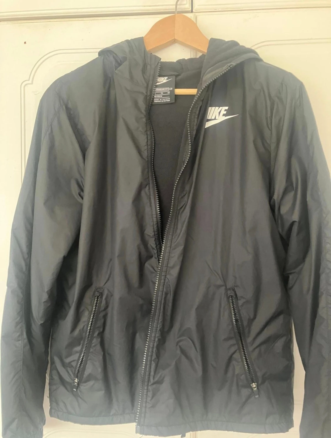 Svart vindjacka från Nike XL