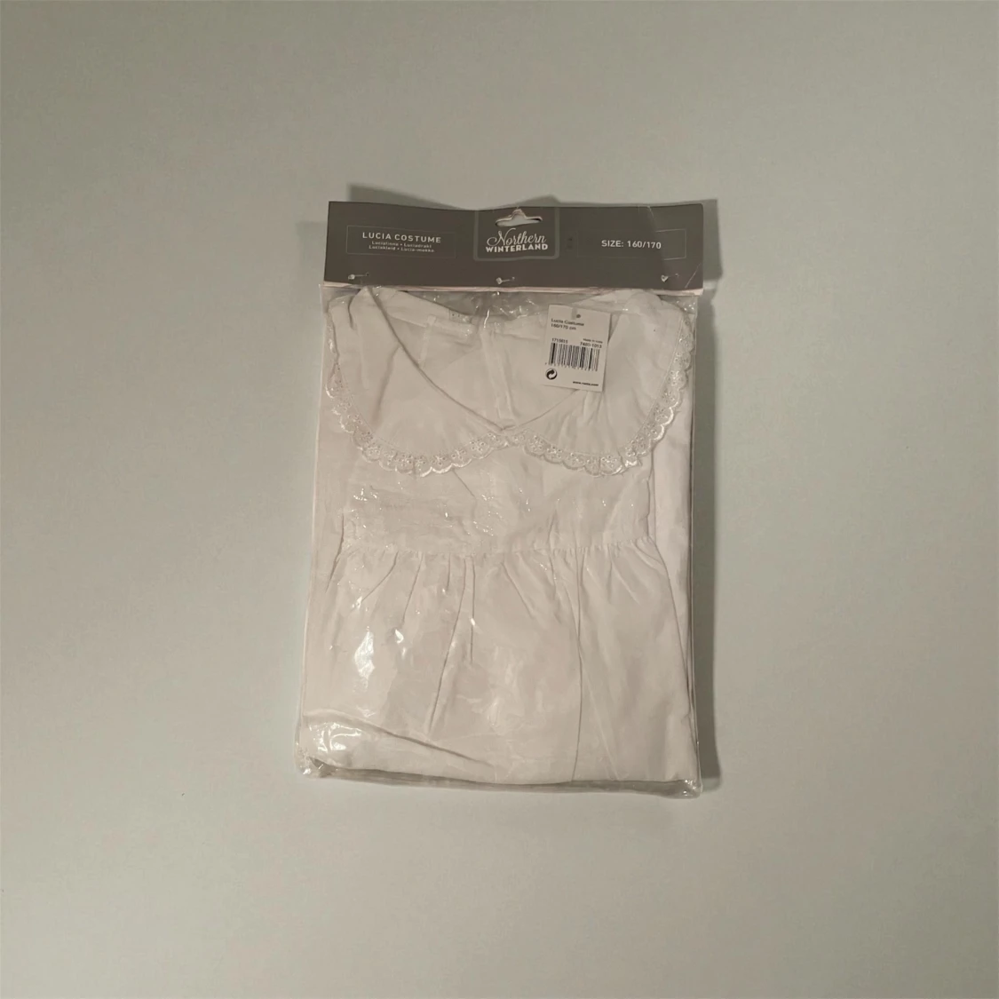 Vit luciaklänning från Northern Winterland