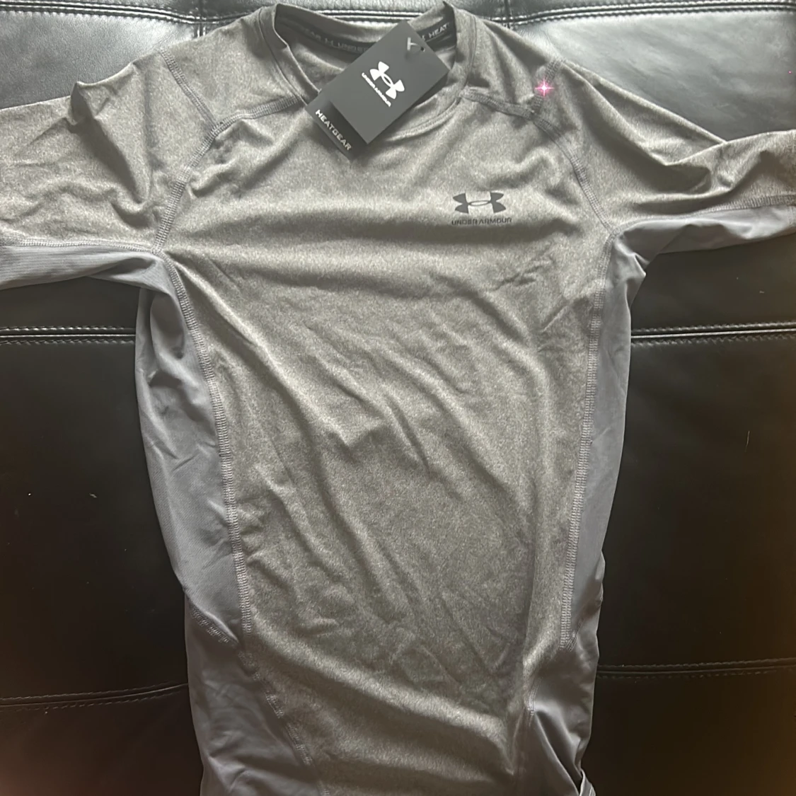 Grå träningströja från Under Armour