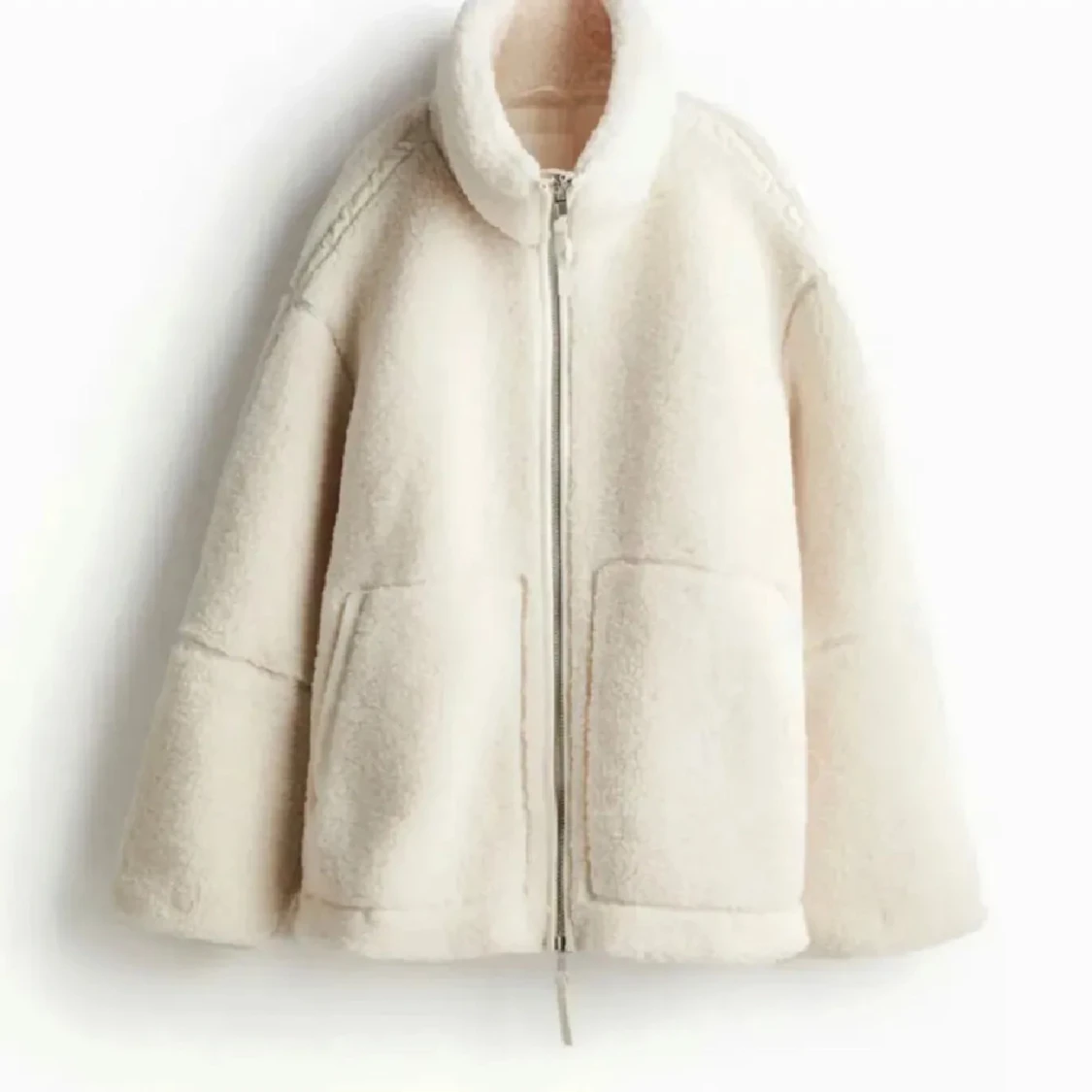 Beige teddyjacka med dragkedja