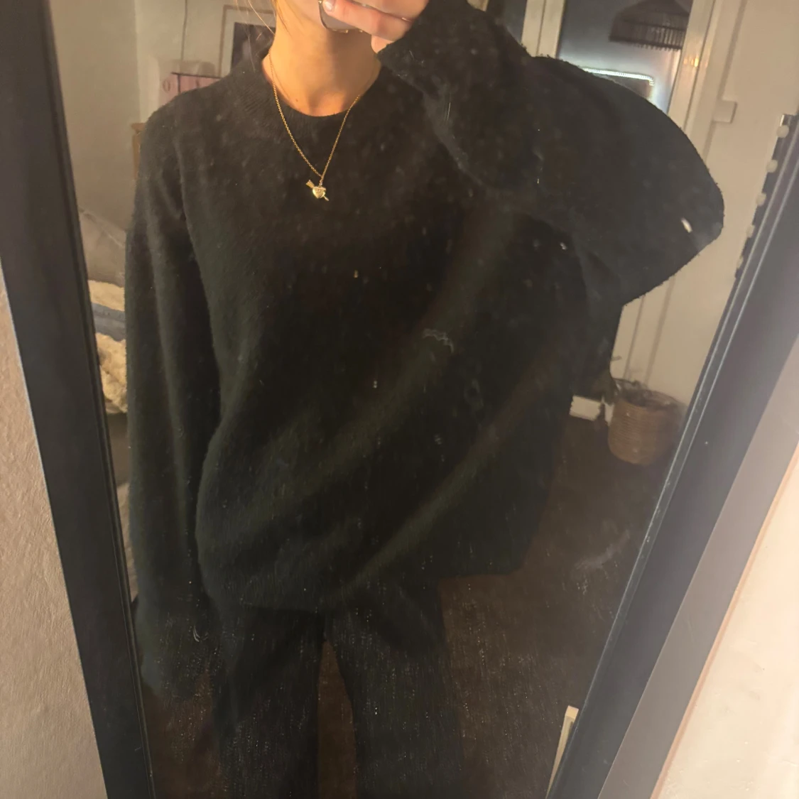 Svart stickad tröja