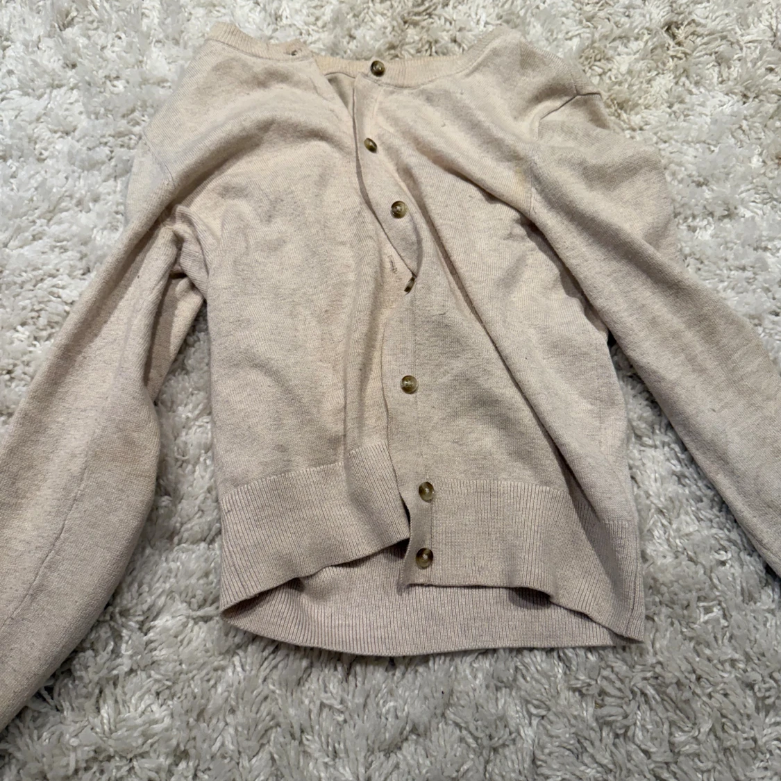 Beige kofta med knappar