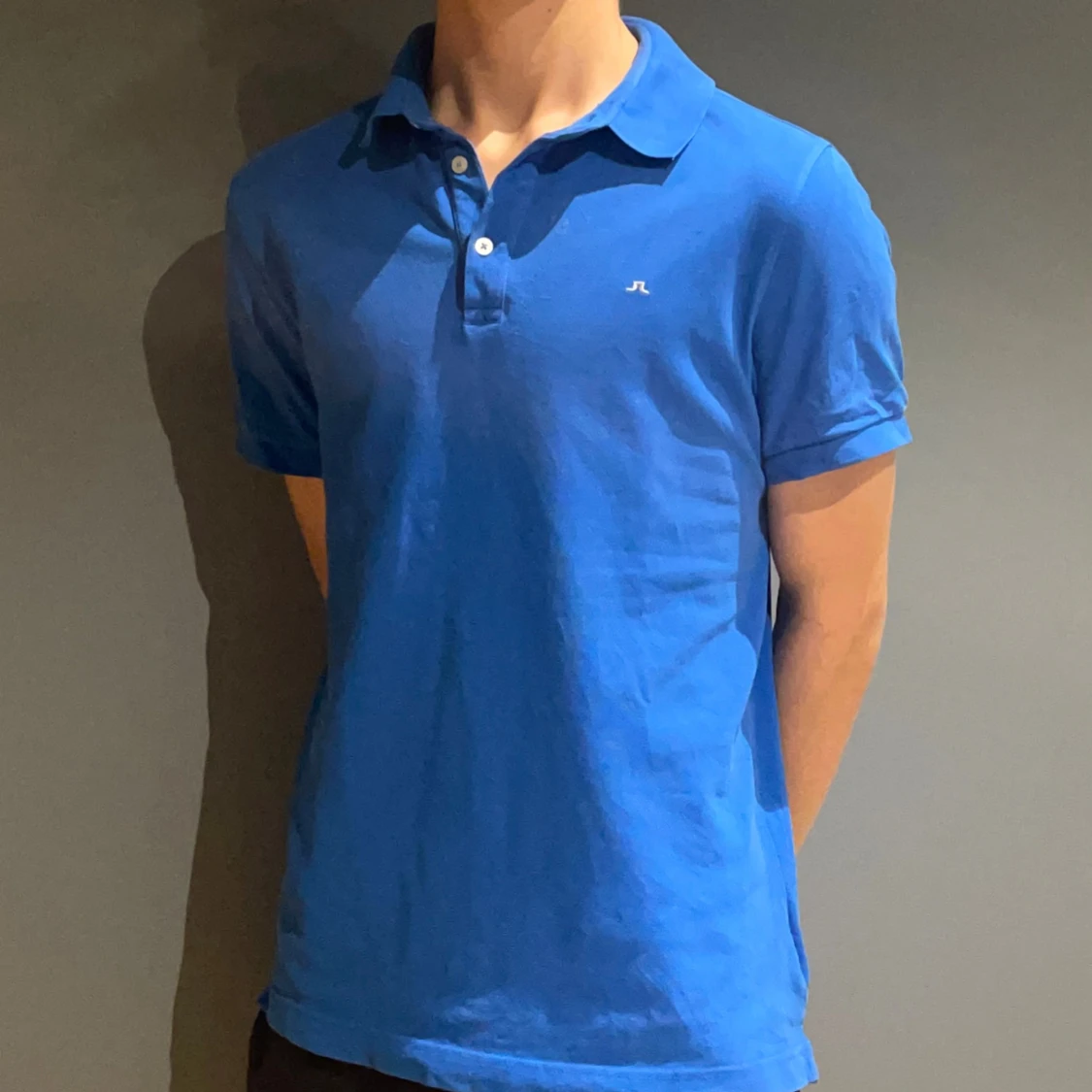 Blå pikétröja från J.Lindeberg M - 1