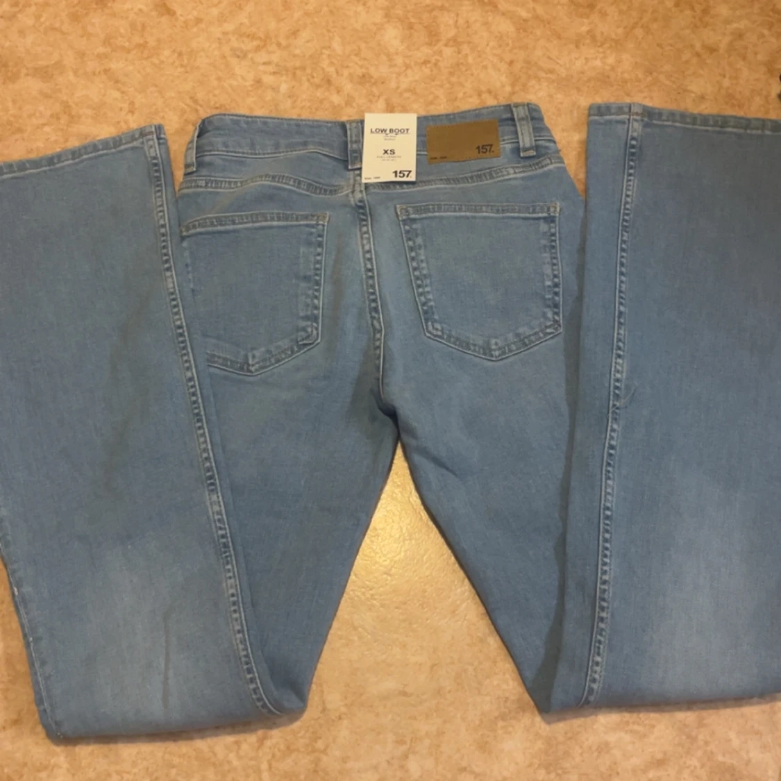 Bootcut jeans i ljusblå denim från 157 - 1