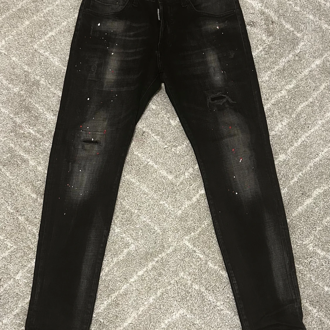 Svarta Dsquared2 jeans med färgstänk