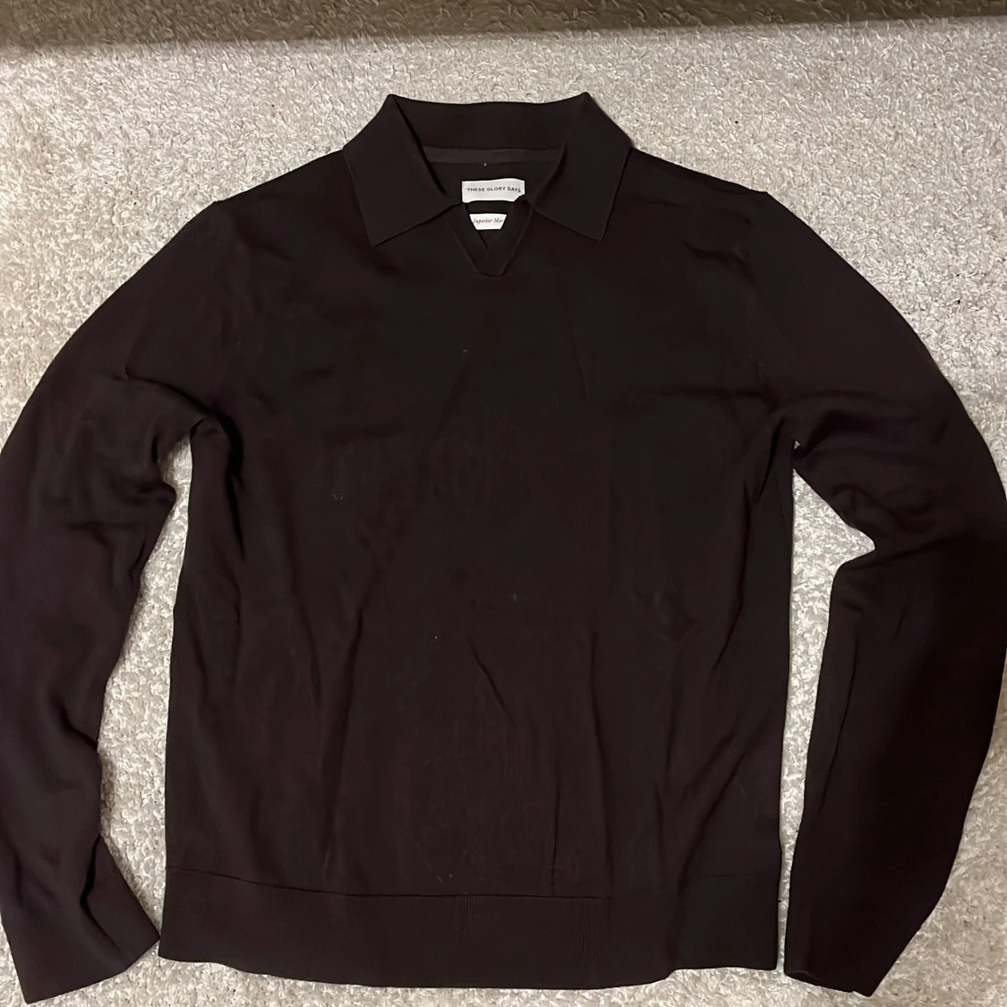 Svart merinotröja från These Glory Days