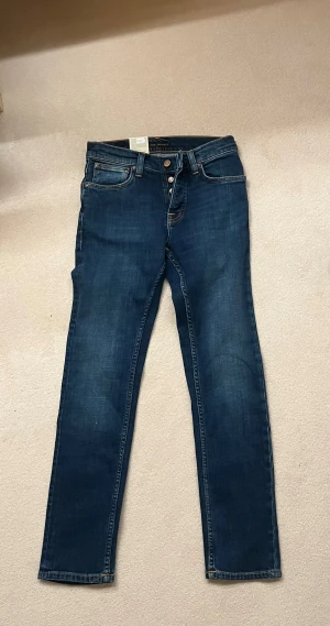 Nudie grim Tim jeans  - Indigo myth grim Tim helt nya med lappar kvar. W28 L30