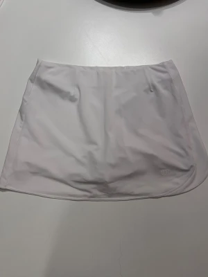 Wilson padelkjol tenniskjol XS vit - Wilson padelkjol tenniskjol XS vit