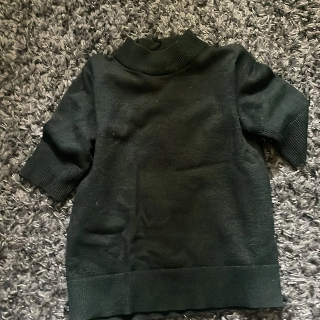 Mörkgrön polotröja från VILA