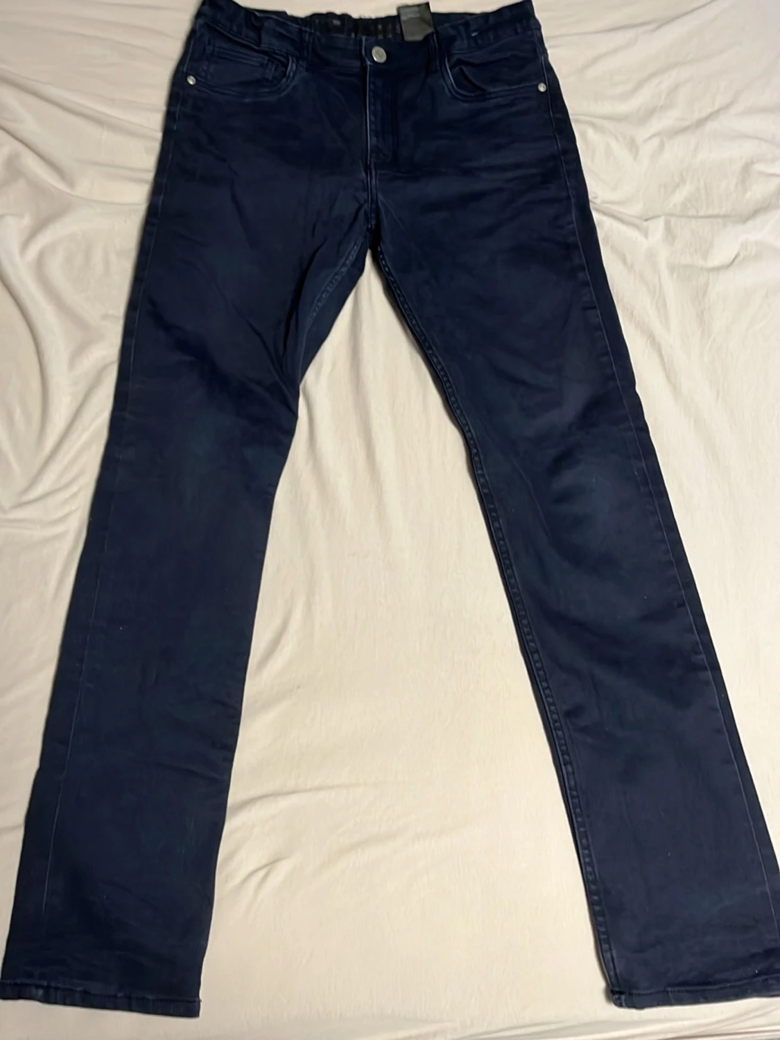 Mörkblå slim fit jeans från H&M
