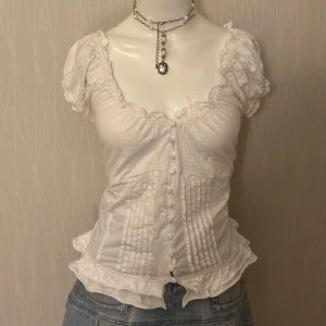 Coquette T-shirt  - Red discolouration on the back fits only L and more 