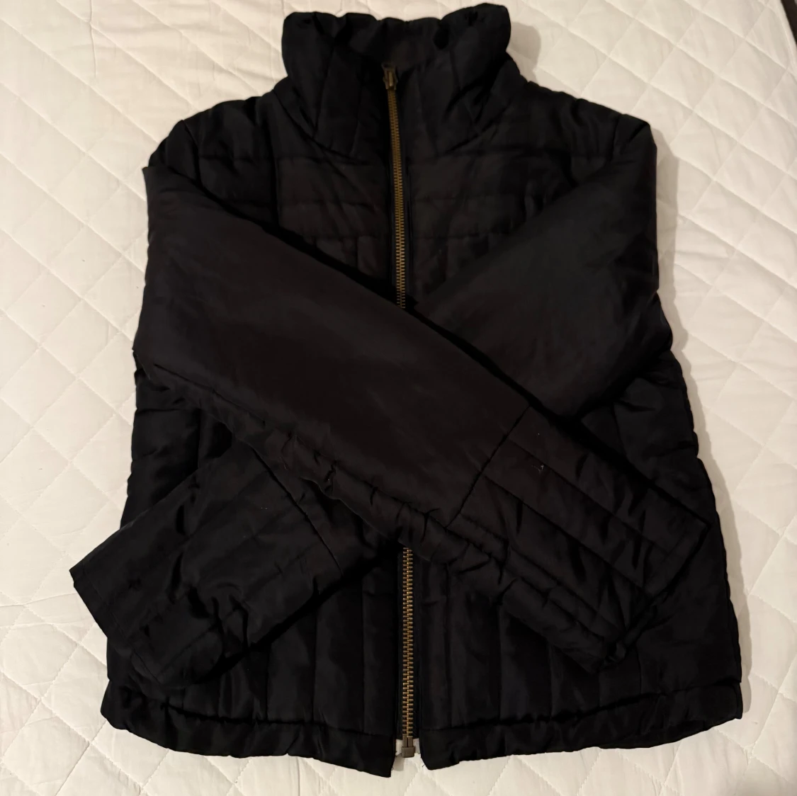 Svart pufferjacka från Moon