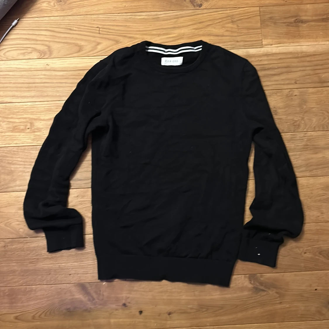 Svart stickad tröja från Pier One