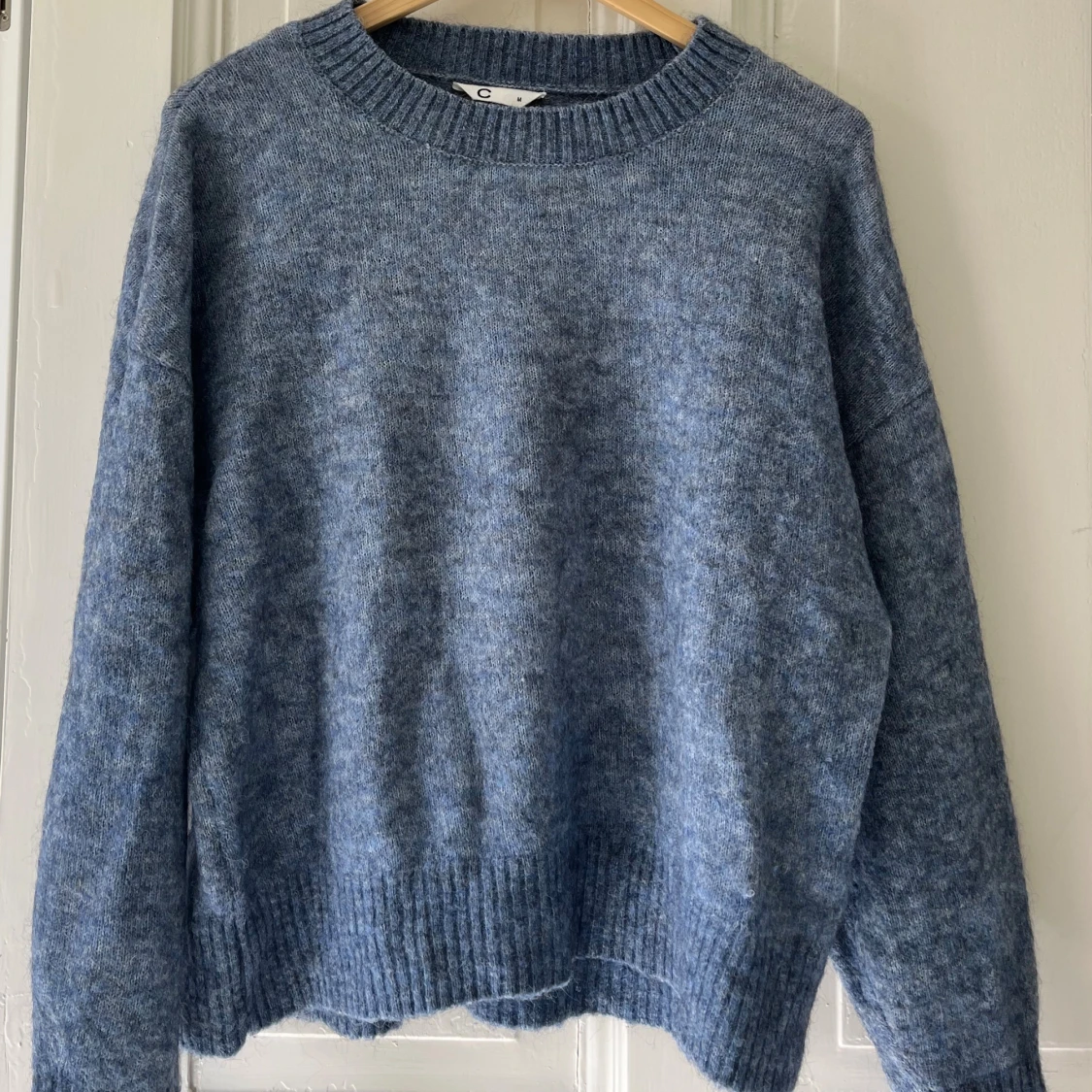 Blå stickad tröja från Cubus