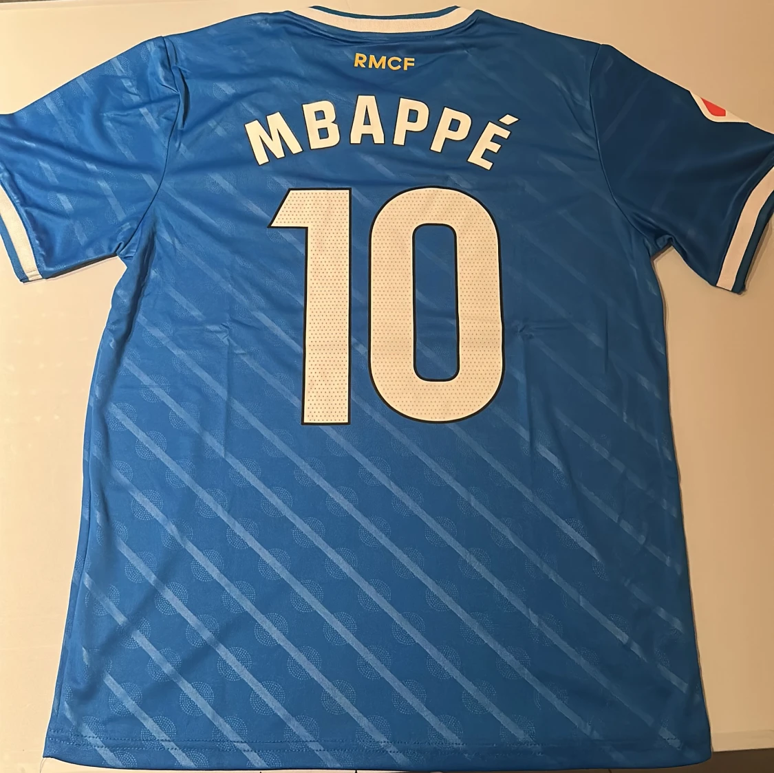 Real Madrid Mbappé blå fotbollströja