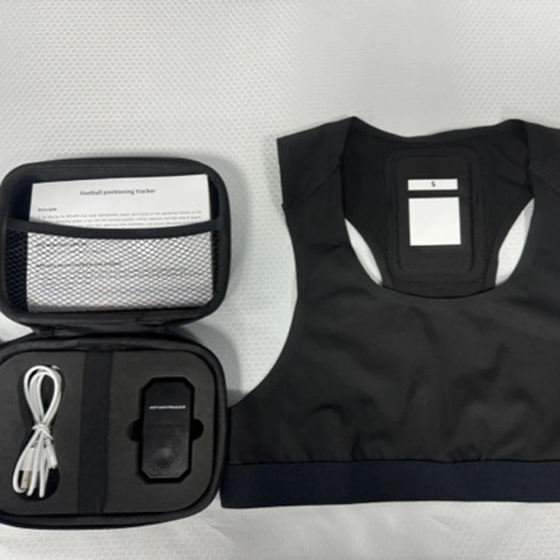 Svart träningsväst med GPS-ficka
