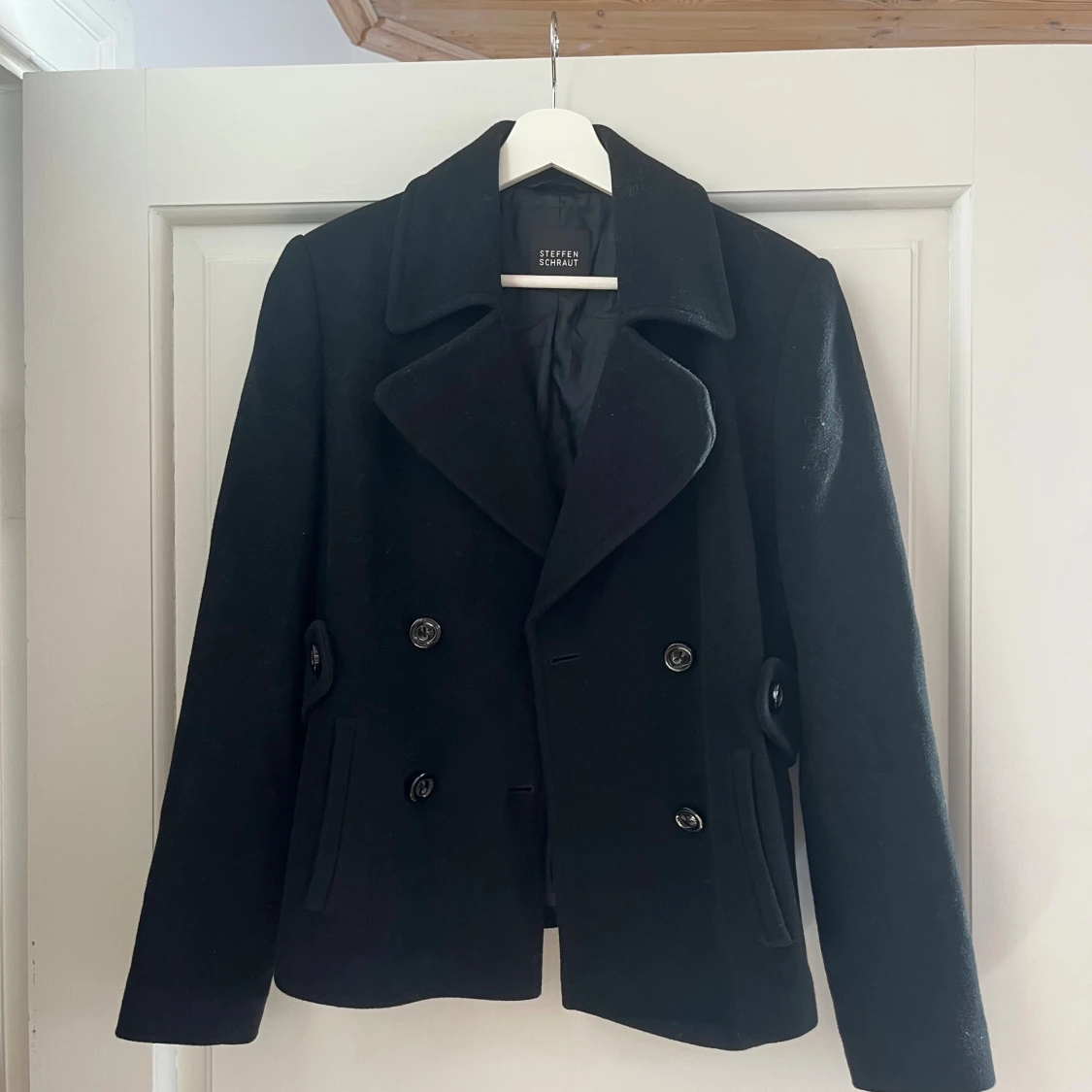 Svart skepparkavaj från Steffen Schraut