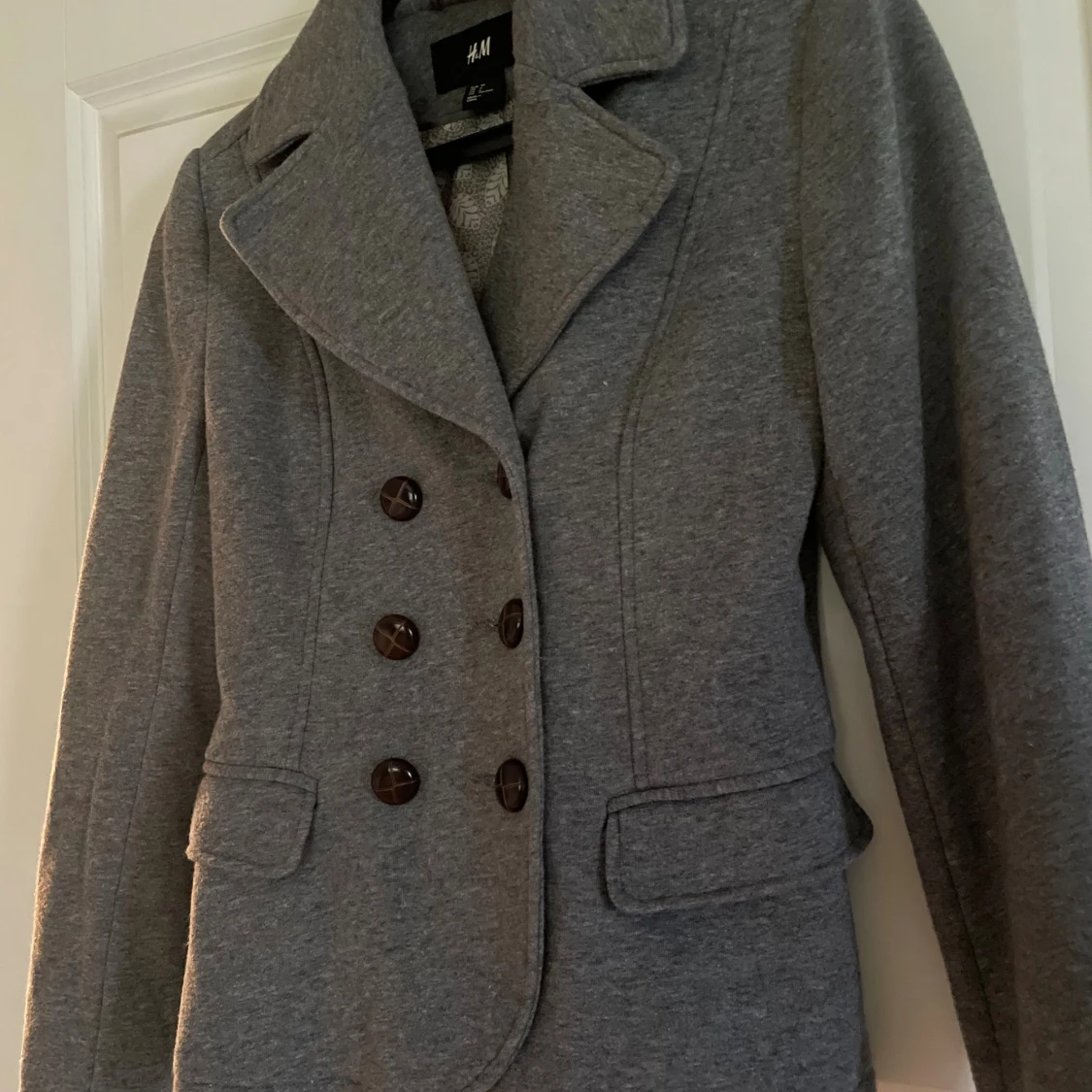 Grå kappa från H&M
